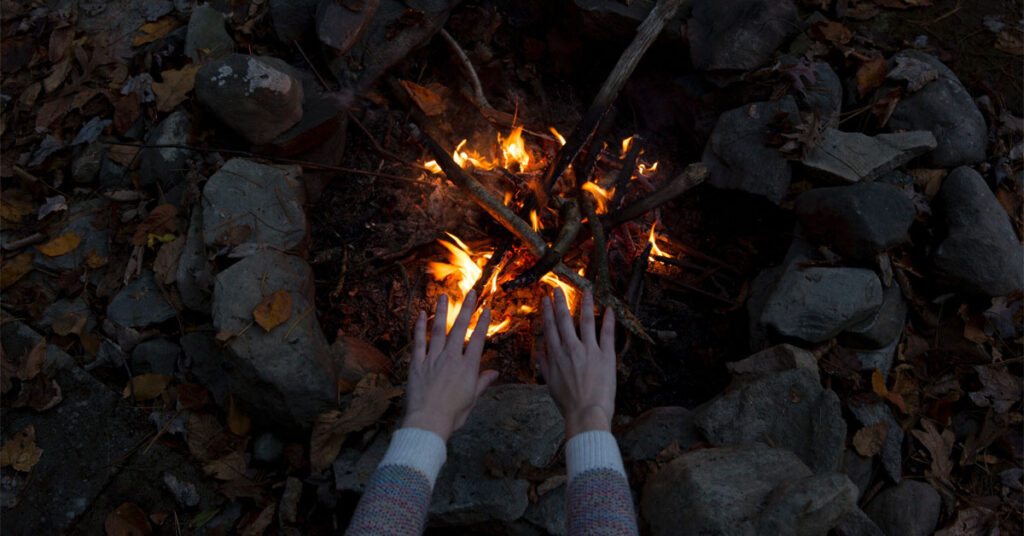 Hands over fire